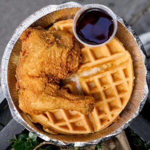 NYC Trip Planning Quiz 🗽: Can We Guess Your Age? Chicken and waffles from Sylvia\'s