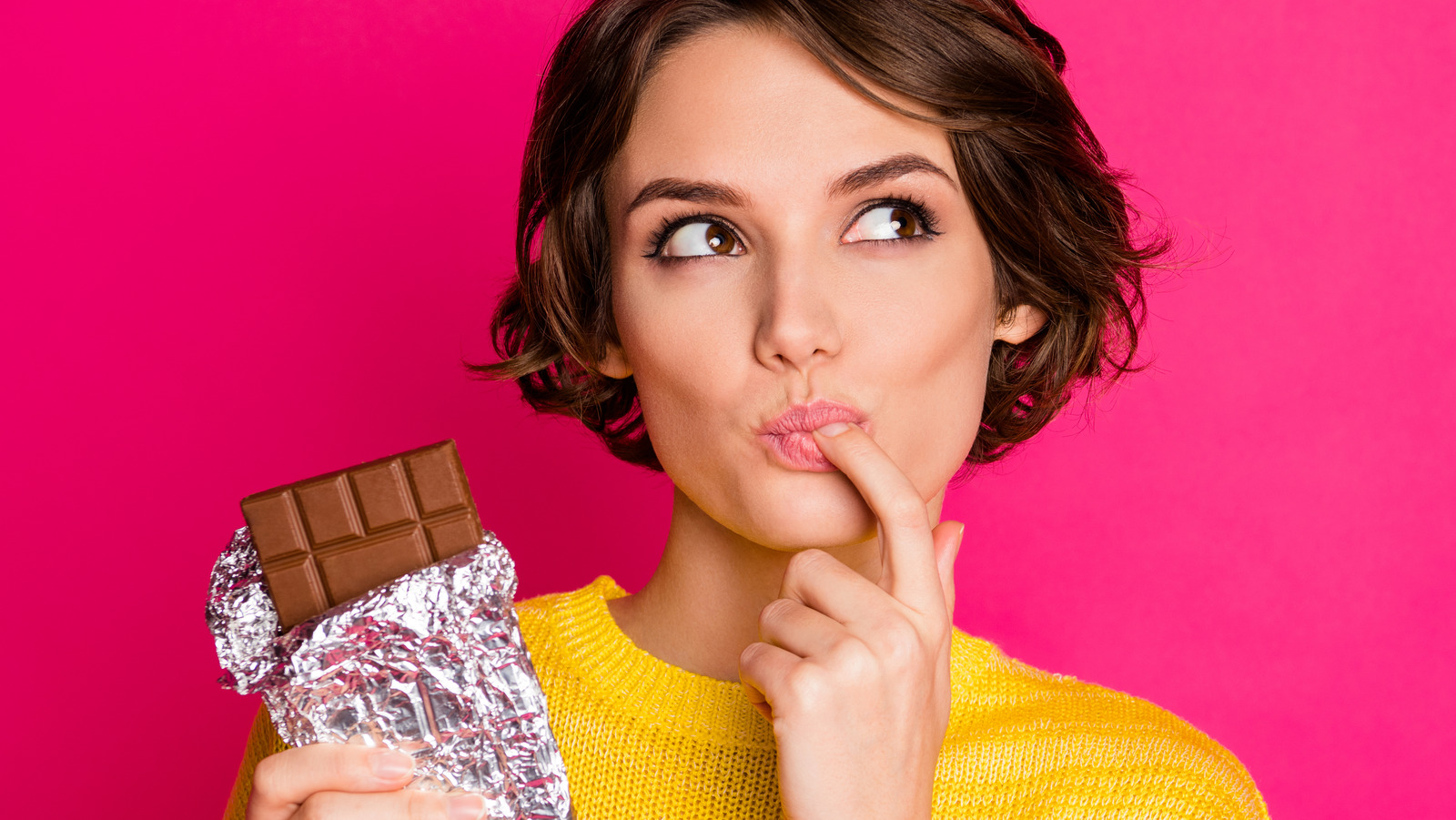 Choose Between Sweet and Salty Snacks and We’ll Guess Your Current Relationship Status Eating chocolate bar